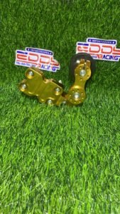 Tensor de cadena montado tipo catre estándar color dorado, repuesto reforzado para motocicletas, duradero y de fácil instalación.